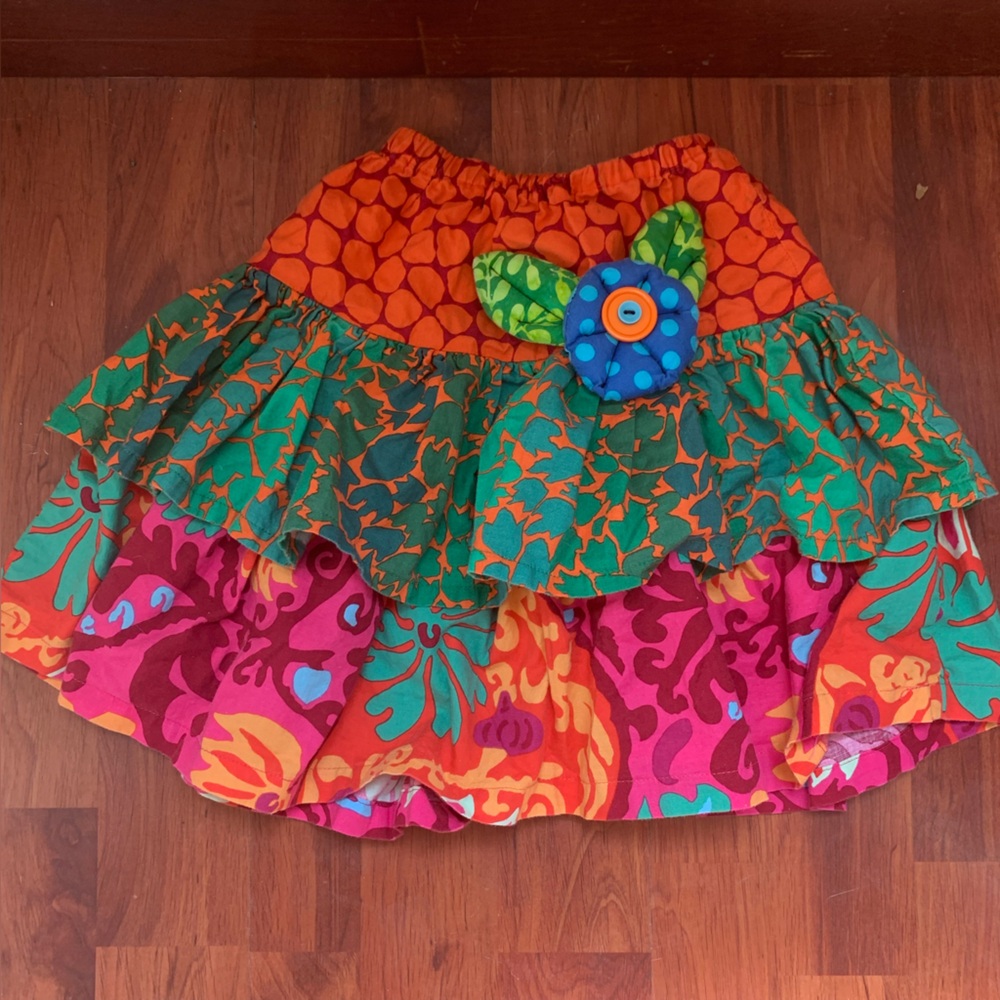 Colorful Patterned Skirt with Floral Accent